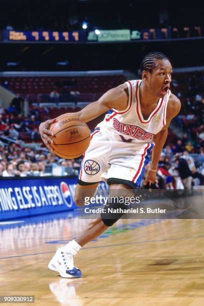 Allen Iverson of the Philadelphia 76ers dribbles during a game played on March 4, 1997 at the First Union Arena in Philadelphia, Pennsylvania. NOTE...