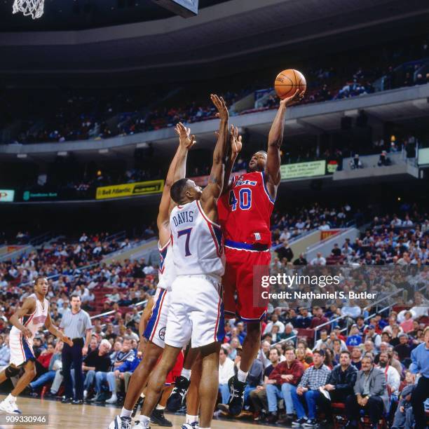 Calbert Cheaney of the Washington Bullets shoots during a game played on March 4, 1997 at the First Union Arena in Philadelphia, Pennsylvania. NOTE...