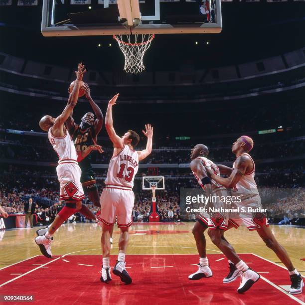 Shawn Kemp of the Seattle SuperSonics shoots during a game played on March 18, 1997 at the United Center in Chicago, Illinois. NOTE TO USER: User...
