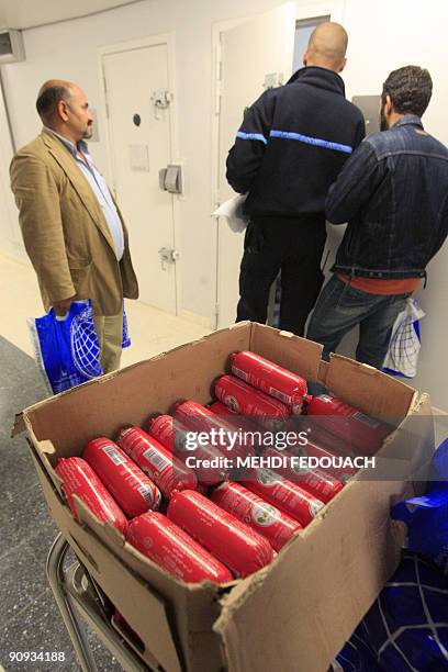 Members of a French Islamic relief organisation "Secours islamique" arrive to give packages to prisoners during Ramadan on September 17, 2009 at the...