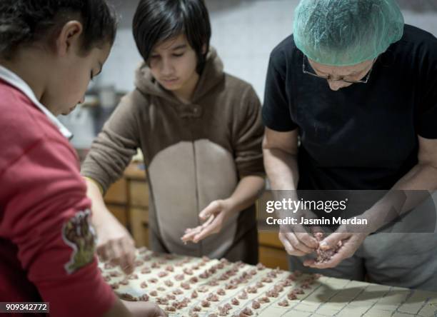 Family gathering for making traditional handmade food