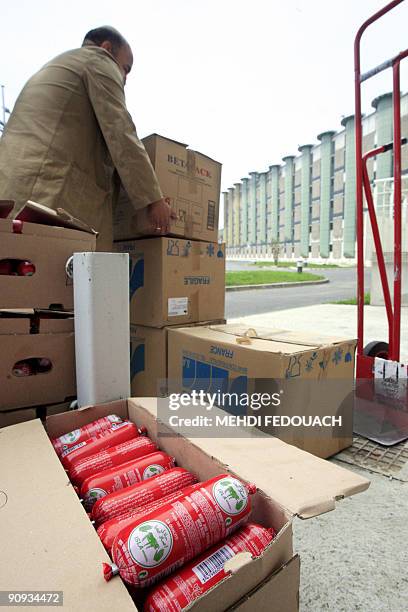 Member of French Islamic relief organisation "Secours islamique" arrives to distribute packages to prisoners during Ramadan on September 17, 2009 at...