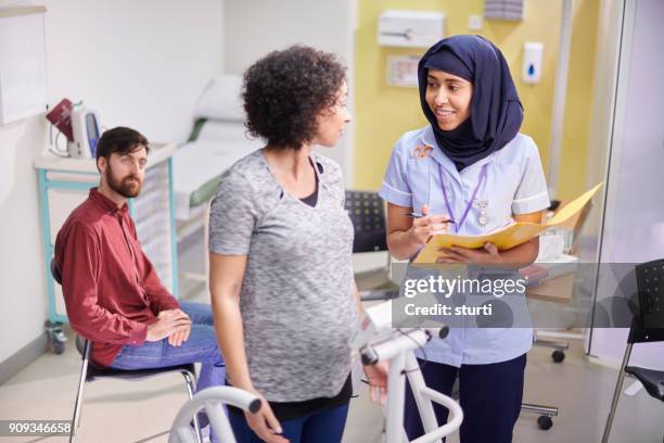 prenatal check up - pregnant muslim stock pictures, royalty-free photos & images