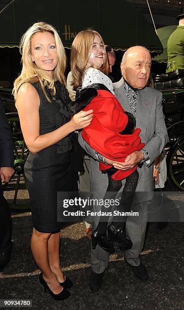 Kirsty Howard poses with Caprice and Mohamed Al-Fayed at Harrods during her 14th birthday celebrations on September 18, 2009 in London, England.