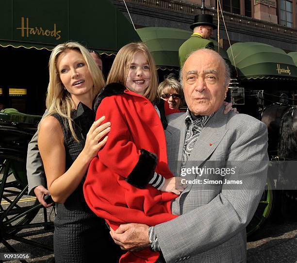 Caprice Bourret poses with Kirsty Howard from the Kirsty Club Charity and Harrods owner Mohammed Al Fayed outside Harrods on September 18, 2009 in...