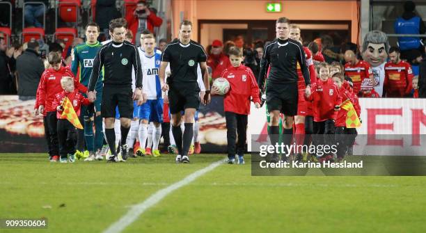 Both teams come into the stadium during the 3.Liga match between FC Rot Weiss Erfurt and 1.FC Magdeburg at Arena Erfurt on January 22, 2018 in...
