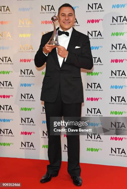 David Walliams, winner of the TV Judge award for "Britain's Got Talent", poses in the press room at the National Television Awards 2018 at The O2...
