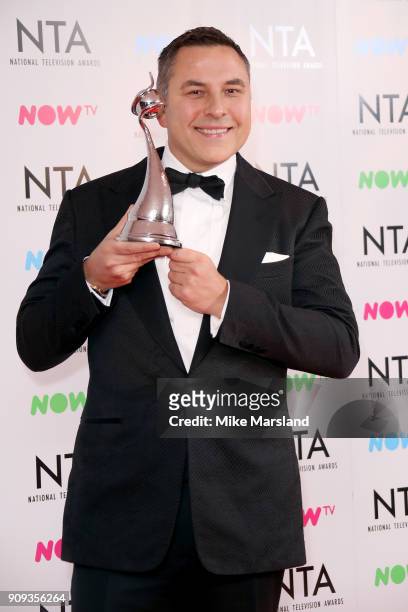David Walliams, winner of the TV Judge award for 'Britain's Got Talent', poses in the press room at the National Television Awards 2018 at The O2...