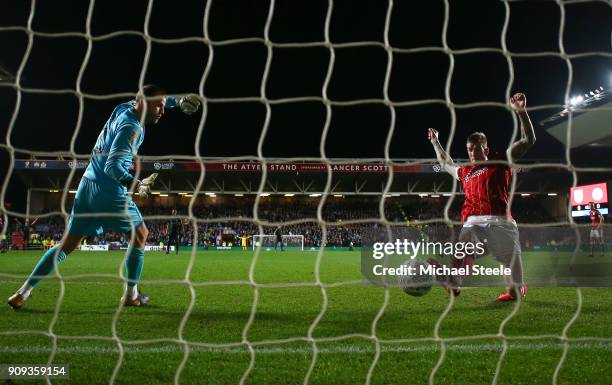 Luke Steele of Bristol City looks on as Aden Flint of Bristol City fails to stop Leroy Sane of Manchester City as he scores their first goal during...