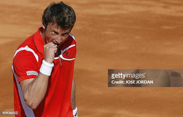 Spanish Juan Carlos Ferrero celebrates his victory against Israeli Dudi Sela during the second match of the Davis Cup semi-final tie between...