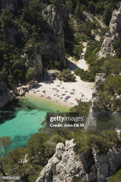 people sunbathing along french riviera - calanques stock pictures, royalty-free photos & images