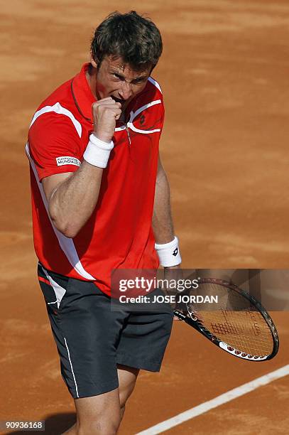 Spanish Juan Carlos Ferrero celebrates his victory against Israeli Dudi Sela during the second match of the Davis Cup semi-final tie between...