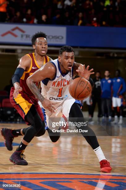 Xavier Rathan-Mayes of the Westchester Knicks handles the ball against the Canton Charge during the game against the Canton Charge shoots against #...