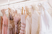 Luxury sparkling women's dresses on hangers