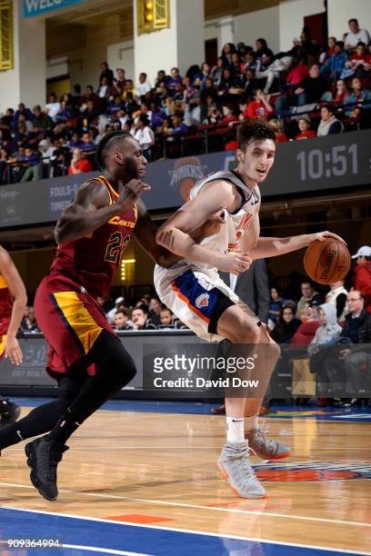 Luke Kornet of the Westchester Knicks handles the ball against the Canton Charge during the game against the Canton Charge shoots against # of the...