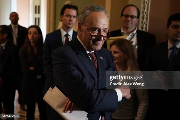 Senate Minority Leader Sen. Chuck Schumer listens during a media briefing after a weekly Senate Democratic Policy Luncheon January 23, 2018 at the...