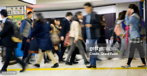 crowd rushing in subway station. - subway station ストックフォトと画像