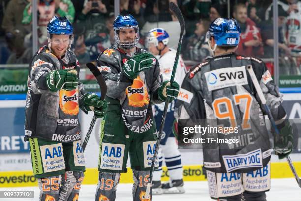 Daniel Schmoelz of Augsburger Panther, Drew LeBlanc of Augsburger Panther and Matt White of Augsburger Panther celebrate during the DEL match between...