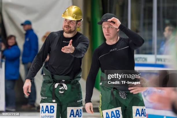 Drew LeBlanc of Augsburger Panther and T.J. Trevelyan of Augsburger Panther look on after the DEL match between Augsburger Panther and EHC Red Bull...