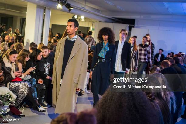 Models walk the runway during the Hope show on the third day of Stockholm Fashion Week at Hope's headquarters on January 23, 2018 in Stockholm,...