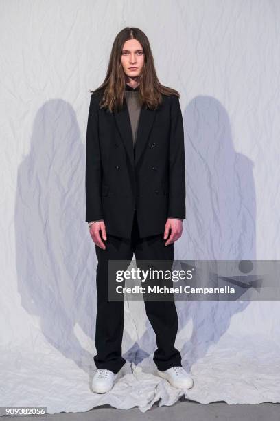 Model poses for a picture during the Hope show on the third day of Stockholm Fashion Week at Hope's headquarters on January 23, 2018 in Stockholm,...