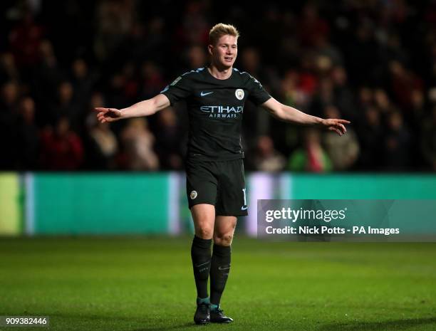 Manchester City's Kevin De Bruyne celebrates scoring his side's third goal of the game during the Carabao Cup semi final, second leg match at Ashton...