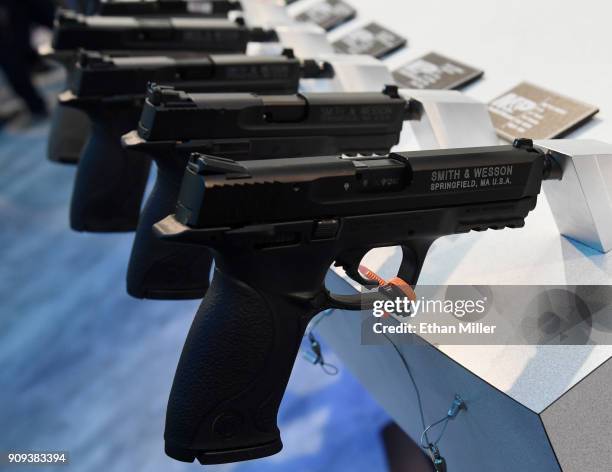 Handguns are displayed at the Smith & Wesson booth at the 2018 National Shooting Sports Foundation's Shooting, Hunting, Outdoor Trade Show at the...