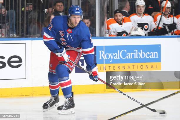 Peter Holland of the New York Rangers skates with the puck against the Philadelphia Flyers at Madison Square Garden on January 16, 2018 in New York...