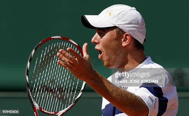 Israeli Dudi Sela reacts during the second match of the Davis Cup semi-final tie between defending champions Spain and Israel against Spanish Juan...