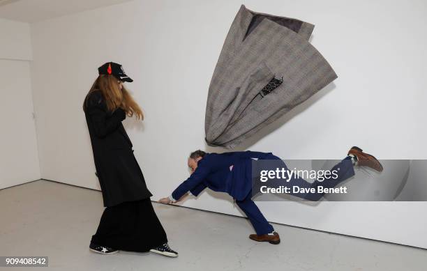 Charlotte Colbert and Nimrod Kamer attend a private view of new large-scale video sculpture "Benefit Supervisor Sleeping" by Charlotte Colbert at...