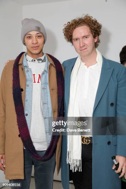 Earl James Charles and Hugh Harris attend a private view of new large-scale video sculpture "Benefit Supervisor Sleeping" by Charlotte Colbert at...