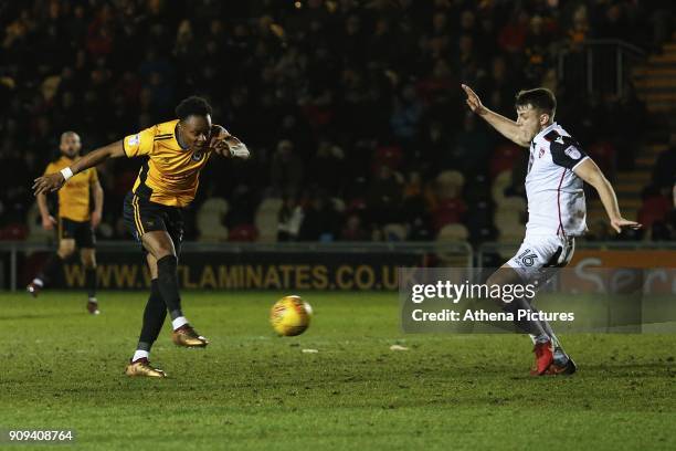 Shawn McCoulsky of Newport County is marked by Sam Lavelle of Morecambe during the Sky Bet League Two match between Newport County and Morcambe at...