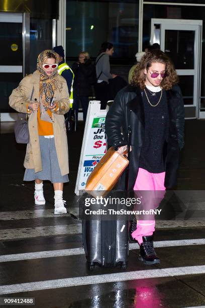 Rita Ora and Andrew Watt are seen at JFK airport in Queens on January 23, 2018 in New York City.