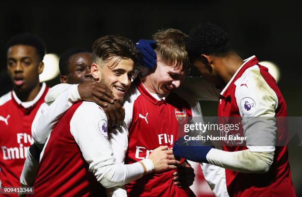 Emile Smith Rowe celebrates with Jeff Reine-Adelaide after scoring his sides 5th goal during the Premier League International Cup match between...