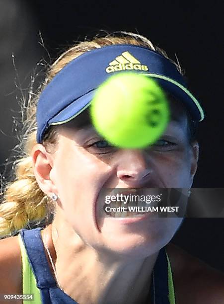 Germany's Angelique Kerber hits a return against Madison Keys of the US during their women's singles quarter-finals match on day 10 of the Australian...