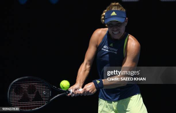 Germany's Angelique Kerber hits a return against Madison Keys of the US during their women's singles quarter-finals match on day 10 of the Australian...