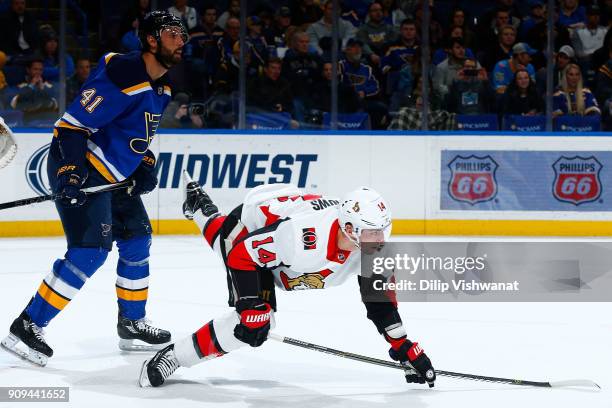 Robert Bortuzzo of the St. Louis Blues defends against Alex Burrows of the Ottawa Senators at Scottrade Center on January 23, 2018 in St. Louis,...