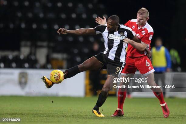 Shola Ameobi of Notts County and Mark Connolly of Crawley Town during the Sky Bet League Two match between Notts County and Crawley Town at Meadow...