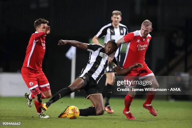 Shola Ameobi of Notts County and Mark Connolly of Crawley Town during the Sky Bet League Two match between Notts County and Crawley Town at Meadow...