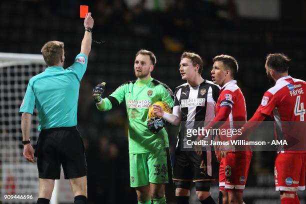 Ross Fitzsimons of Notts County is shown a red card by match referee Robert Lewis during the Sky Bet League Two match between Notts County and...