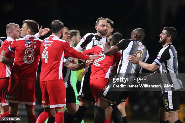 Lewis Young of Crawley Town gets into a confrontation with Nicky Hunt of Notts County and Shola Ameobi of Notts County during the Sky Bet League Two...