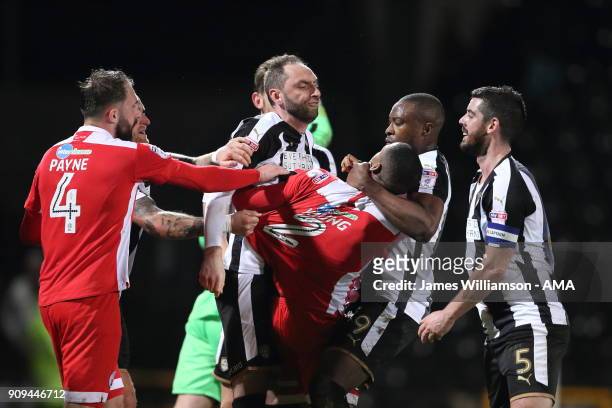 Lewis Young of Crawley Town gets into a confrontation with Nicky Hunt of Notts County and Shola Ameobi of Notts County during the Sky Bet League Two...
