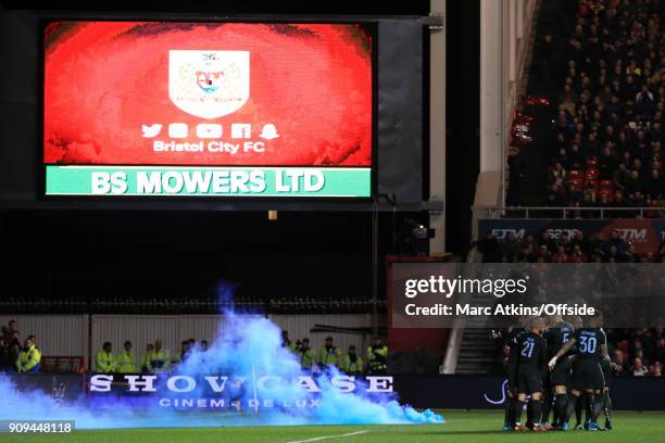 Sky blue smoke bomb goes off as Manchester City celebrate their 2nd goal scored by Sergio Aguero during the Carabao Cup Semi-Final 2nd leg match...