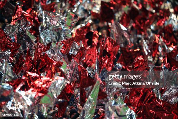Dozens of foil flags are waved prior to kick off during the Carabao Cup Semi-Final 2nd leg match between Bristol City and Manchester City at Ashton...