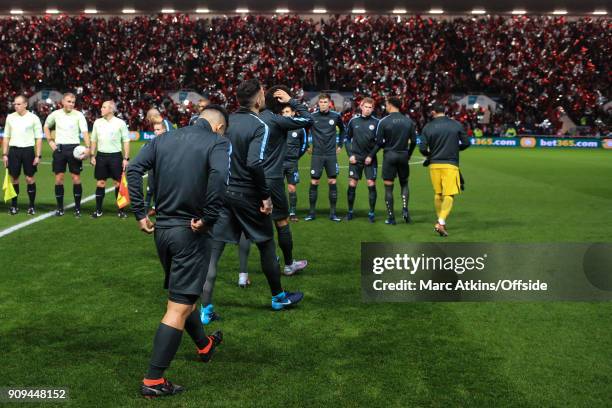 Sergio Aguero of Manchester City follows his team mates as they line up pre-match at Ashton Gate during the Carabao Cup Semi-Final 2nd leg match...