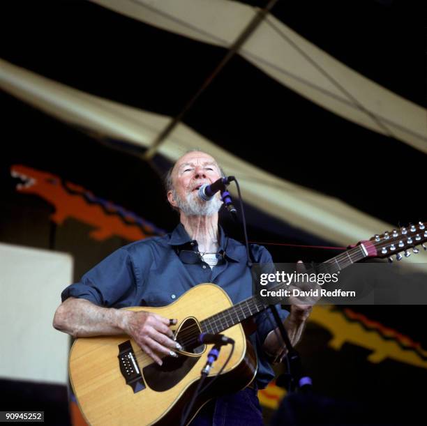 Pete Seeger performs on stage at the New Orleans Jazz and Heritage Festival in New Orleans, Louisiana on May 06,1995.