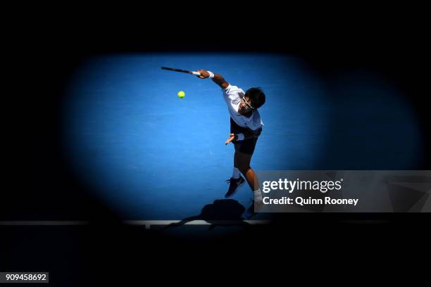 Hyeon Chung of South Korea serves in his quarter-final match against Tennys Sandgren of the United States on day 10 of the 2018 Australian Open at...