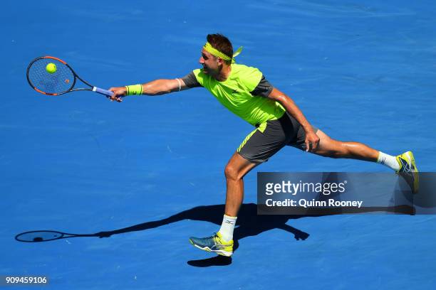 Tennys Sandgren of the United States plays a forehand in his quarter-final match against Hyeon Chung of South Korea on day 10 of the 2018 Australian...