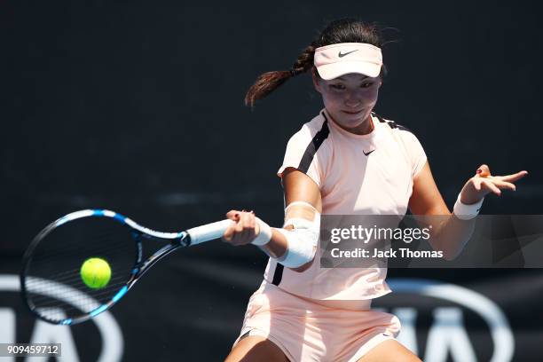 Xinyu Wang of China plays a forehand in her match against Mananchaya Sawangkaew of Thailand during the Australian Open 2018 Junior Championships at...