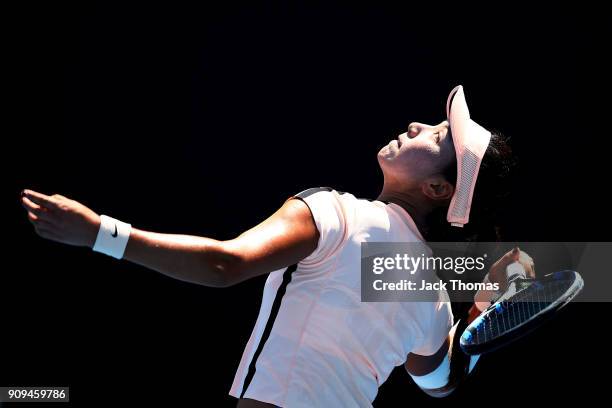 Xinyu Wang of China serves in her match against Mananchaya Sawangkaew of Thailand during the Australian Open 2018 Junior Championships at Melbourne...